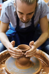 Fototapeta na wymiar Master of pottery