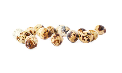 Quail eggs isolated over white background