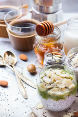 Healthy breakfast chia seed pudding almond milk fruit honey coffee