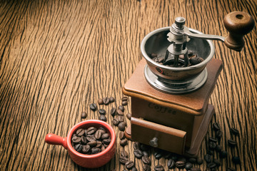 Vintage manual coffee grinder with coffee bean