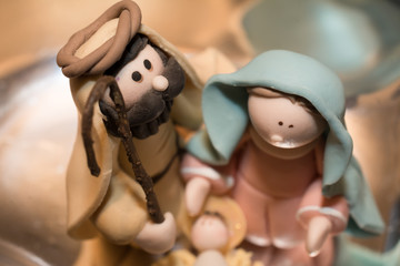 José y María con el Niño Jesús.