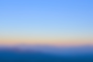 Obraz premium abstract bright blurred sunrise sky for vacation or travel background
