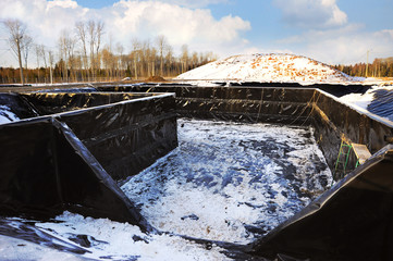 Construction of a new landfill for the storage of garbage and waste. Winter time