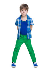 Handsome little boy in a blue shirt - 128751453