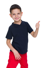 Little boy in a black shirt with his thumb up