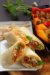 Burritos wraps with chicken and vegetables.