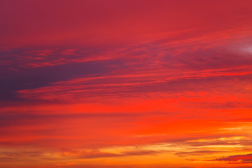 Fiery orange sunset sky. Beautiful sky as background.