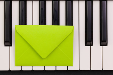 Funny arrangement envelope on the piano keybords