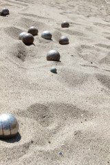 Playing of bocce in the sand