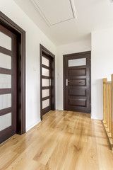 Corridor with wooden doors