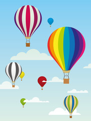 Hot air balloons. Group of colorful balloons and clouds in the sky