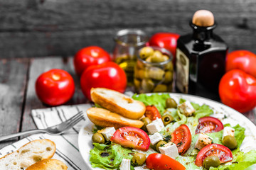 Greek salad, vegetable salads with toasted bread, vegetarian dish