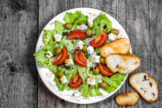Vegetarian salad, vegetable greek salads, top view 