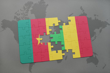 puzzle with the national flag of cameroon and mali on a world map.