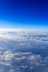 the sea of clouds sunset sky background, view from the window of