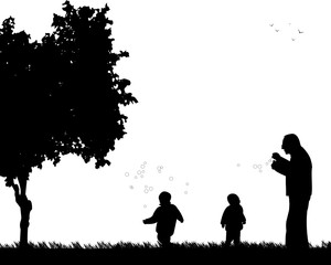 Grandfather playing with grandchildren, one in the series of similar images silhouette