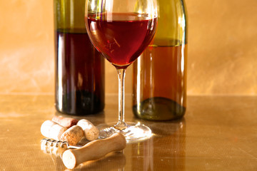 wine bottle and glass on a table