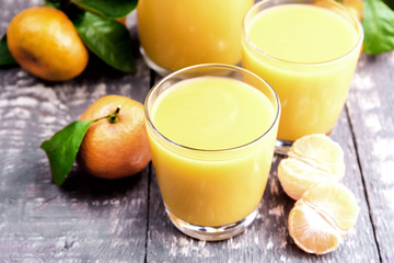 Fresh juice of ripe mandarins in a small glass