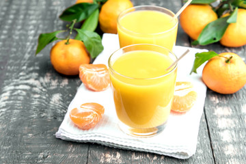 Fresh juice of ripe mandarins in a small glass