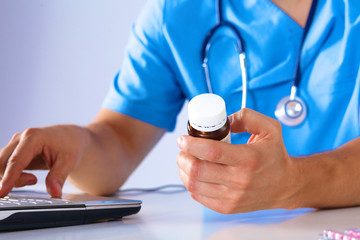 Business meeting at the table shaking hands conclusion of the contract