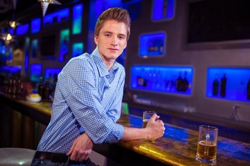 Portrait of man at bar counter