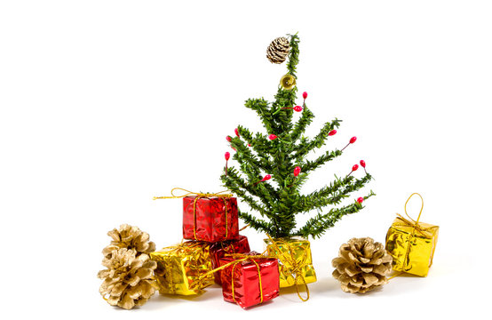 Christmas background with decorations and gift boxes on white background / Christmas tree with gifts on white background.
