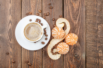 Coffee with tangerine. Top view