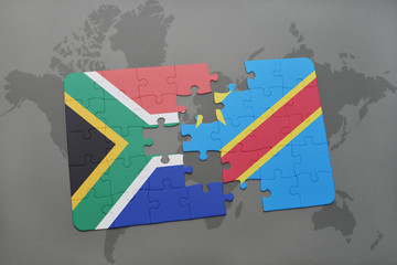 puzzle with the national flag of south africa and democratic republic of the congo on a world map.