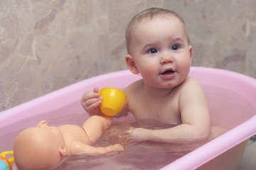 Bathing little baby