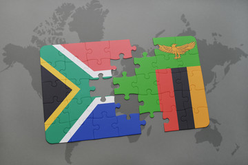 puzzle with the national flag of south africa and zambia on a world map.