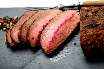 grilled steak on a black slate