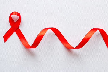 Fototapeta na wymiar red ribbon symbol of World AIDS Day