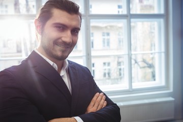 Confident businessman in creative office