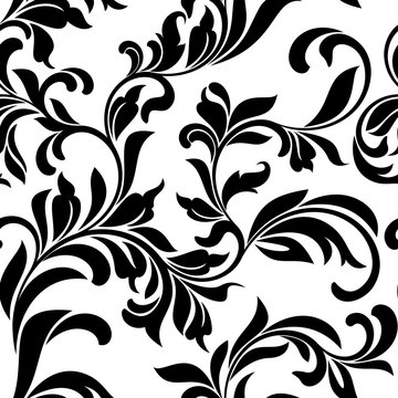 Seamless pattern with white floral tracery on a white background