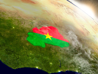 Burkina Faso with flag in rising sun