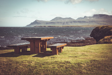 Wooden table and benches in resting area