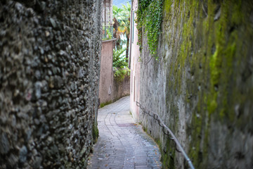 Old streets of ancient Italian town. Como lake.