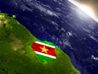 Suriname with flag in rising sun