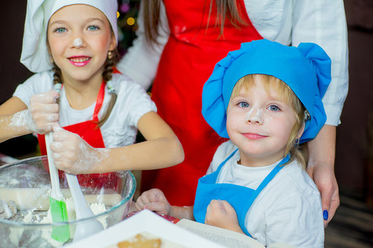 children baking christmas cookies