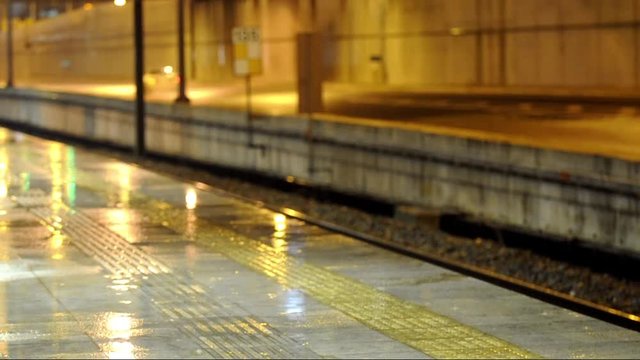 rainy night beside railway