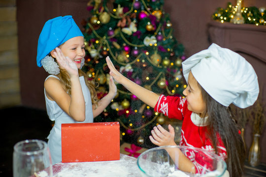 children baking christmas cookies