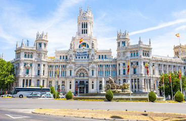 Fototapeta na wymiar MADRID, SPAIN - JUNE 25, 2016: Communications Palace from Plaza de Cibeles, Madrid, Spain