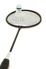 Badminton racket with feather shuttlecock on white background