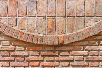 Closeup of brick wall with semicircle shape