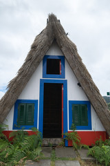Fototapeta na wymiar Traditional House in Madeira Island, Santana, Portugal
