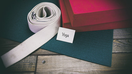 Yoga mat, a paper sticker with a label