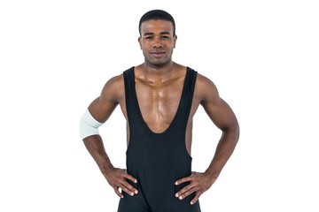 Athlete standing with hand on hip