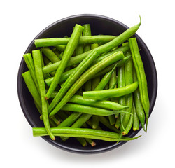 Bowl of green beans isolated on white from above