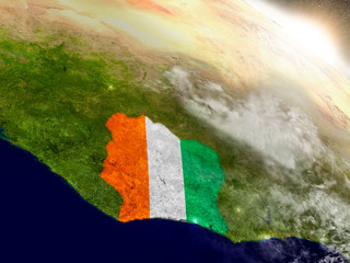 Ivory Coast with flag in rising sun