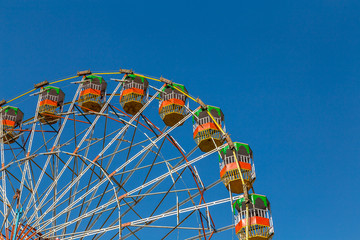 Giant ferry wheel and blue sky